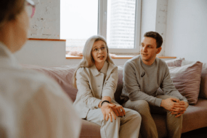 Couple talking to a therapist during a counseling session